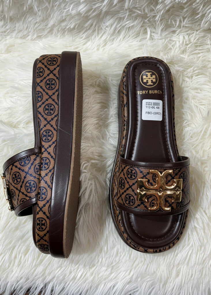 Tory heel flats