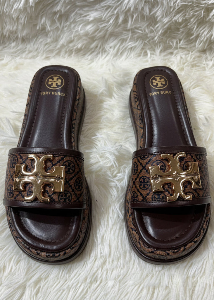 Tory heel flats